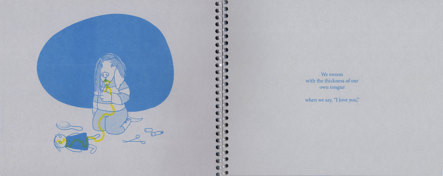 An open spread of the zine, printed on gray paper with a clear coil binding at the center. On the left page is an illustration of a basset hound in human clothing, wearing an off centered wig, and drawing a line of yellow lip stick in a line across a doll laying on the floor, up his clothed body, and onto his opened mouth. Behind him, an ovular field of blue gives the sense of a walled space, and a hairbrush, forceps, and a second opened lipstick, are spread out across the floor. 